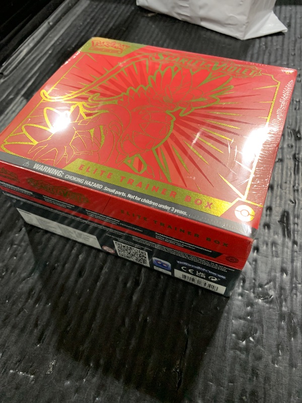 Photo 1 of Pokémon TCG: Scarlet & Violet Elite Trainer Box (Miraidon Purple or Koraidon Red, Random Color)
