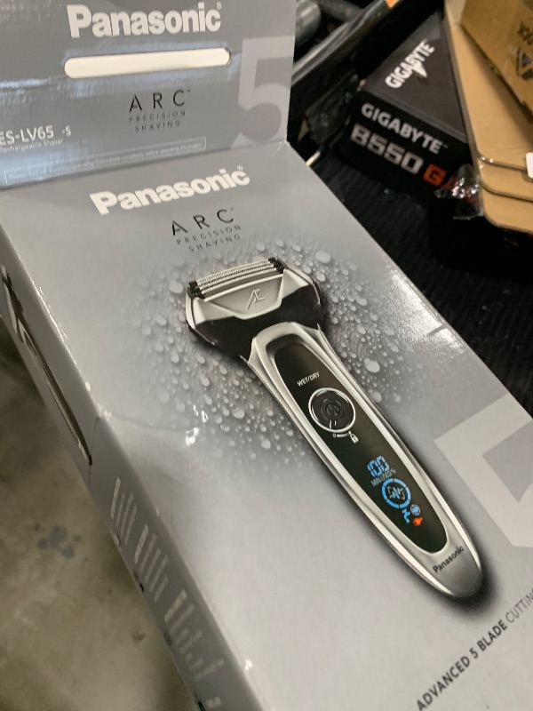 Photo 1 of Panasonic ARC5 Electric Razor for Men with Pop-Up Trimmer, Wet/Dry 5-Blade Electric Shaver with Intelligent Shave Sensor and Multi-Flex Pivoting Head – ES-LV65-S (Silver)