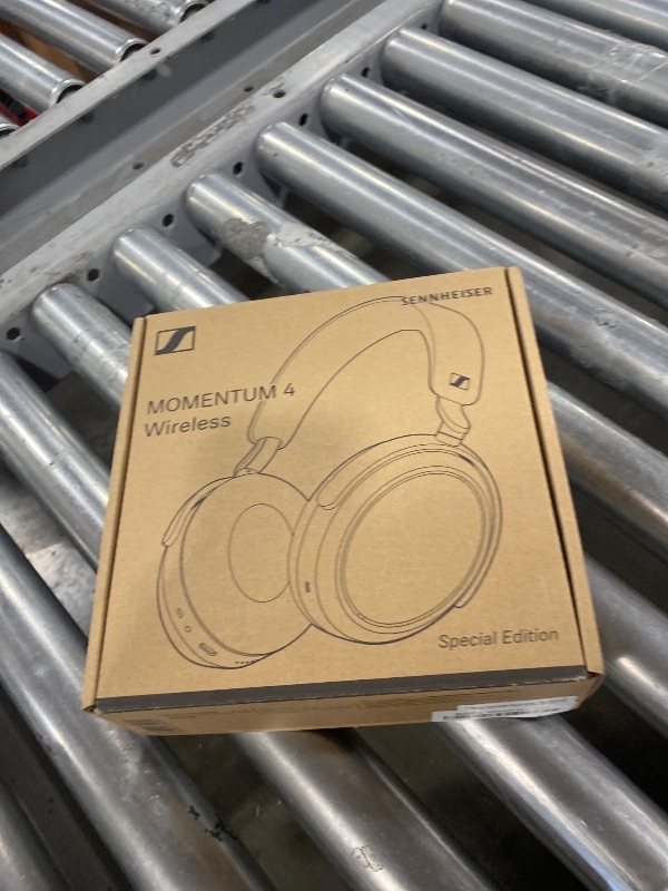 Photo 1 of Sennheiser MOMENTUM 4 Wireless Noise Cancelling Headphones - Bluetooth Headset for Crystal-Clear Calls, Adaptive Noise Cancellation, Over-Ear Headphones, 60h Battery Life, Folding Design, Black/Copper