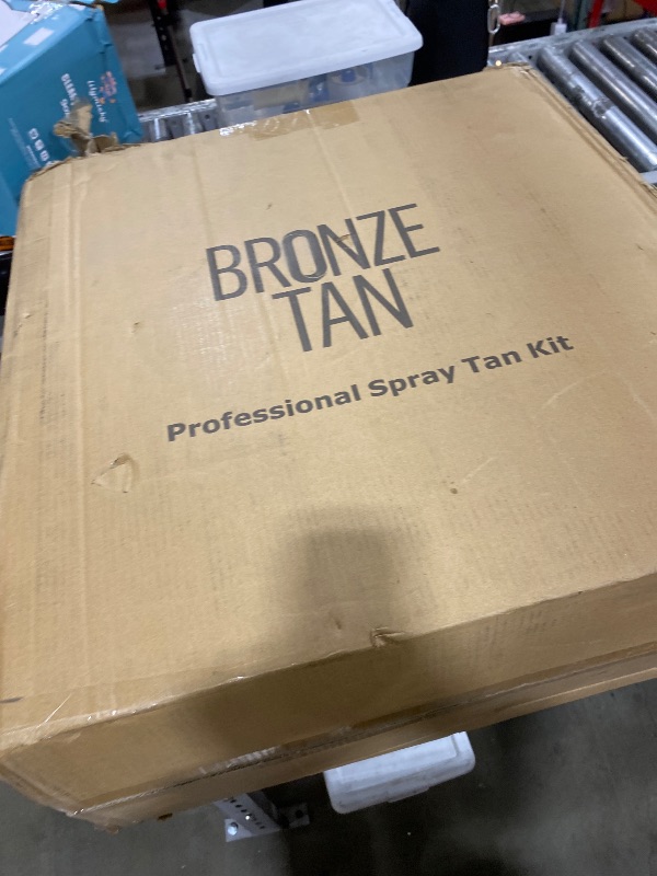 Photo 1 of Commercial Spray Tan Machine Kit - Includes Disposable Spray Tan Supplies, Pop Up Tent, 3 Solution Cups, and HVLP Tanning Machine by Bronze Tan