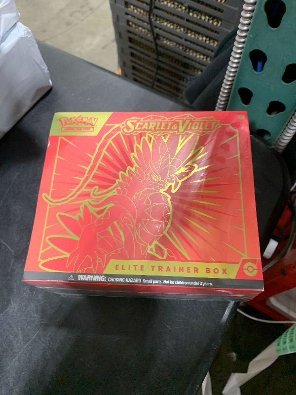 Photo 1 of Pokemon TCG: Scarlet and Violet Elite Trainer Box - Koraidon Red (1 Full Art Promo Card, 9 Boosters and Premium Accessories)
