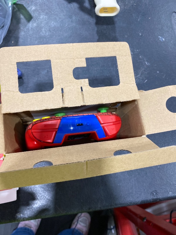 Photo 1 of Super Mario Nintendo switch controller color red