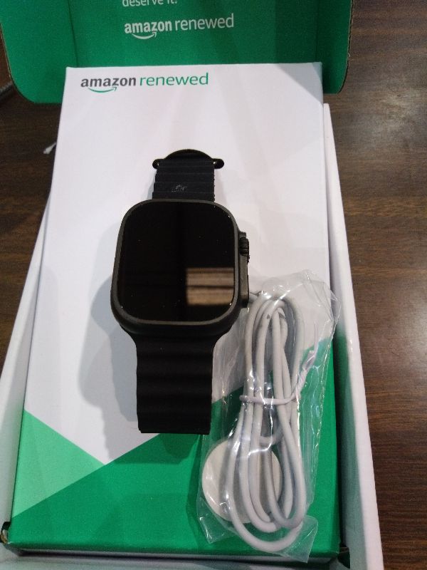 Photo 1 of *SALVAGABLE* Apple Watch Ultra 2 (GPS + Cellular, 49MM) - Black Titanium Case with Black Ocean Band (Renewed Premium)