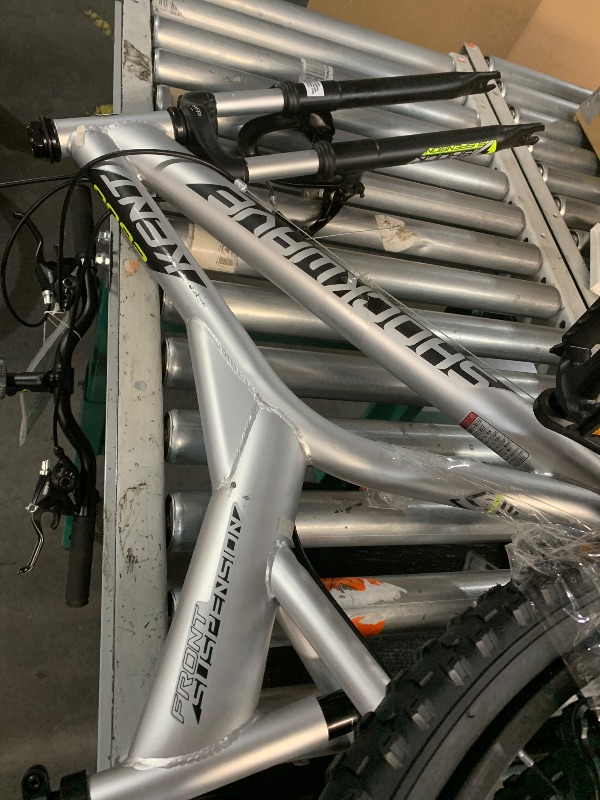 Photo 1 of ***STOCK PHOTO FOR REFERENCE ONLY******** 
24 Inch Mountain Bike, Metallic Nickel Frame, 21-Speed Shimano Twist Shifting, Front Suspension, Comfort
