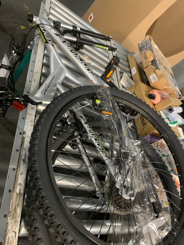 Photo 1 of ***STOCK PHOTO FOR REFERENCE ONLY******** 
24 Inch Mountain Bike, Metallic Nickel Frame, 21-Speed Shimano Twist Shifting, Front Suspension, Comfort