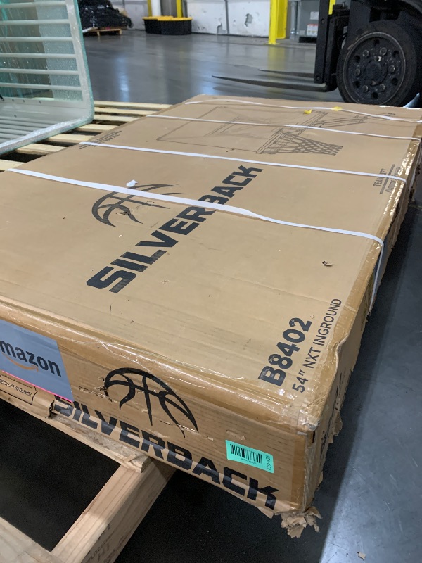 Photo 1 of ***FACTORY SEALED*** Silverback Height Adjustable In-Ground Basketball Hoop with Tempered Glass Backboard, Pro-Style Breakaway Rim, Pole and Backboard Pad