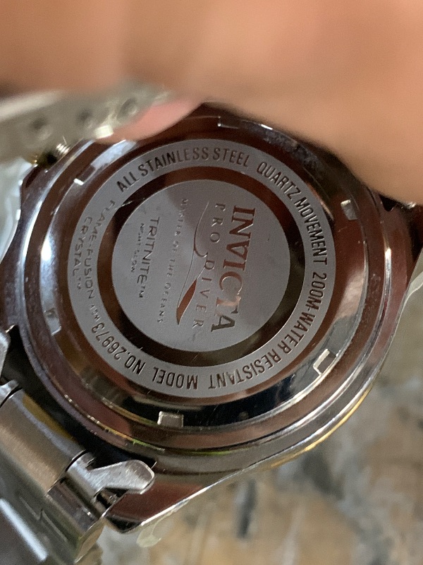 Photo 1 of ***PARTS ONLY NONFUNCTIONAL***
Invicta Men's Pro Diver Quartz Watch with Stainless Steel Strap, Two Tone, 20 (Model: 26973)