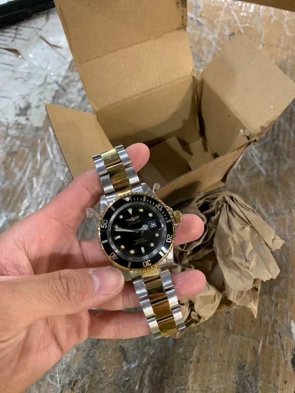 Photo 1 of ***PARTS ONLY NONFUNCTIONAL***
Invicta Men's Pro Diver Quartz Watch with Stainless Steel Strap, Two Tone, 20 (Model: 26973)
