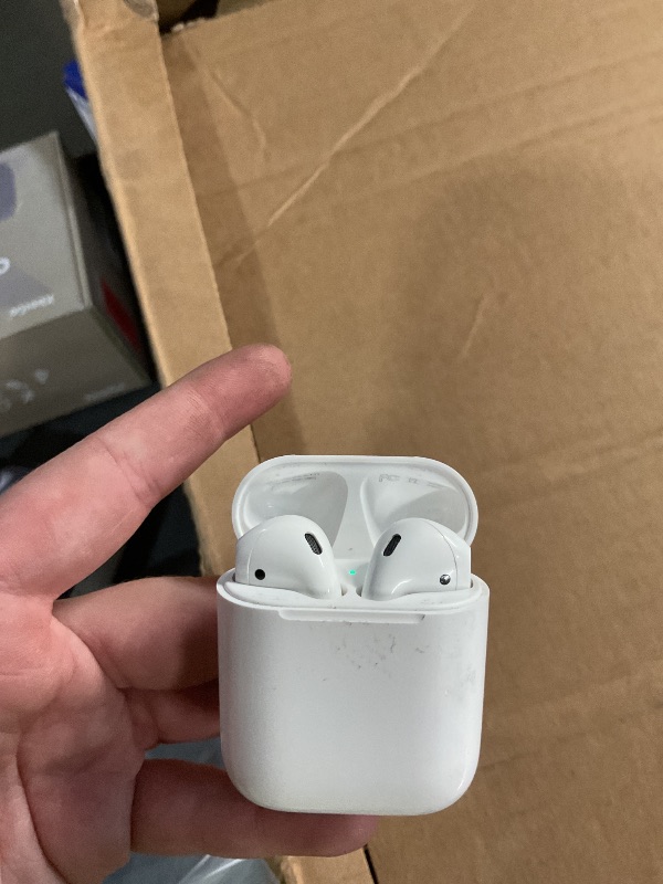 View 2 of *** ICLOUD LOCKED**DAMAGED SEE NOTES ***
Apple AirPods Wireless Earbuds with Lightning Charging Case
