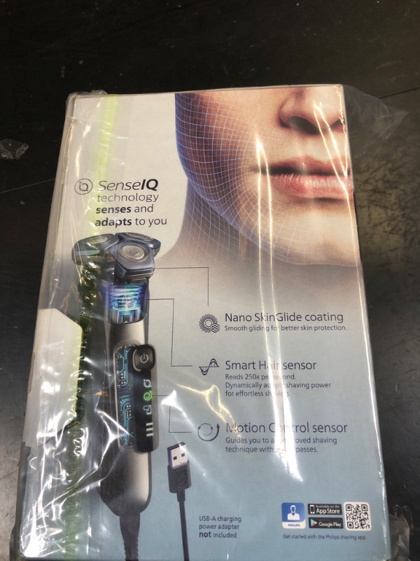 Photo 1 of Philips Norelco Shaver 7800, Rechargeable Wet & Dry Electric Shaver with SenseIQ Technology, Quick Clean Pod, Charging Stand, Travel Case and Pop-up Trimmer, S7885/85