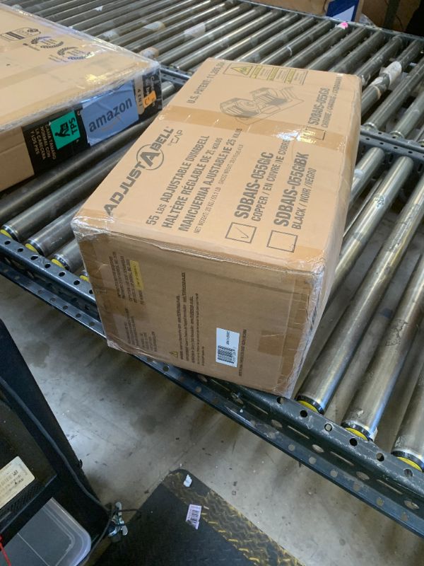 Photo 1 of CAP Barbell 55 lb Single Adjustable Dumbbell with Full Rotation Copper Handle