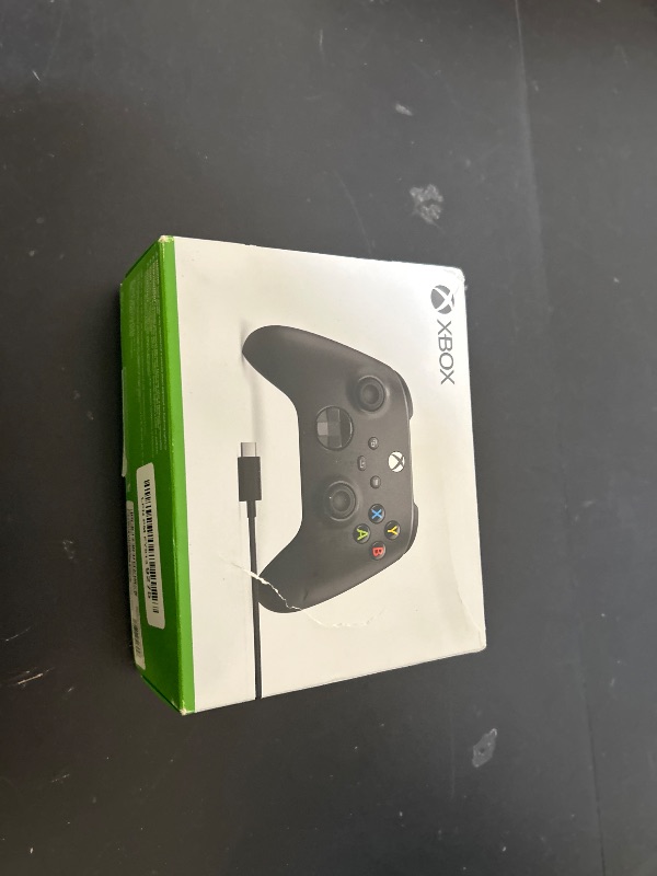 Photo 1 of Xbox Wireless Gaming Controller + USB-C® Cable (2025) – Carbon Black – Play on Xbox, Windows, Android, iOS, FireTV Sticks, Smart TVs, VR Headsets