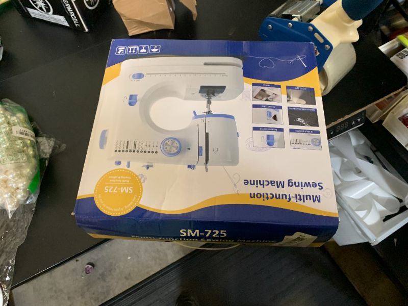 Photo 1 of Stoigeld Sewing Machine for Beginners with 20Pcs Fabric & 32Pcs Sewing Threads Kit,Portable Sewing Machine with 12 Built-in Stitches & 2 Speed(High-Low Speeds)-SM-725