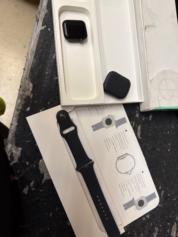 Photo 1 of Apple Watch SE [GPS 40mm case] Smartwatch with Jet Black Aluminum Case with Black Sport Band - M/L