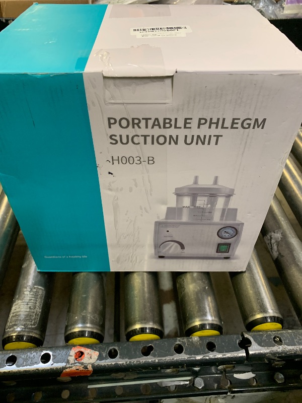 Photo 1 of Portable phlegm suction machine