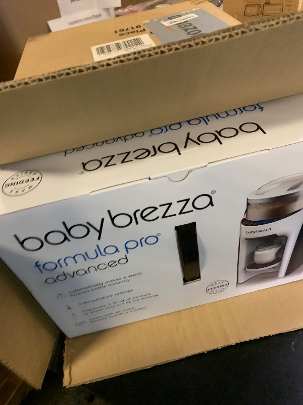 Photo 1 of Baby Brezza New and Improved Formula Pro Advanced Formula Dispenser Machine - Automatically Mix a Warm Formula Bottle Instantly - Easily Make Bottle with Automatic Powder Blending, White