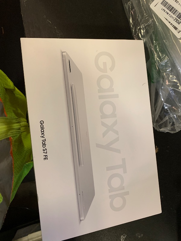 Photo 1 of SAMSUNG Galaxy Tab S7 FE 12.4” 256GB WiFi Android Tablet, Large Screen, S Pen Included, Multi Device Connectivity, Long Lasting Battery, US Version, 2021, Mystic Silver         Model #SDM: T733NZSFXAR mISTIC : sILVER  sm t733 sERIAL # R52R908ENDF