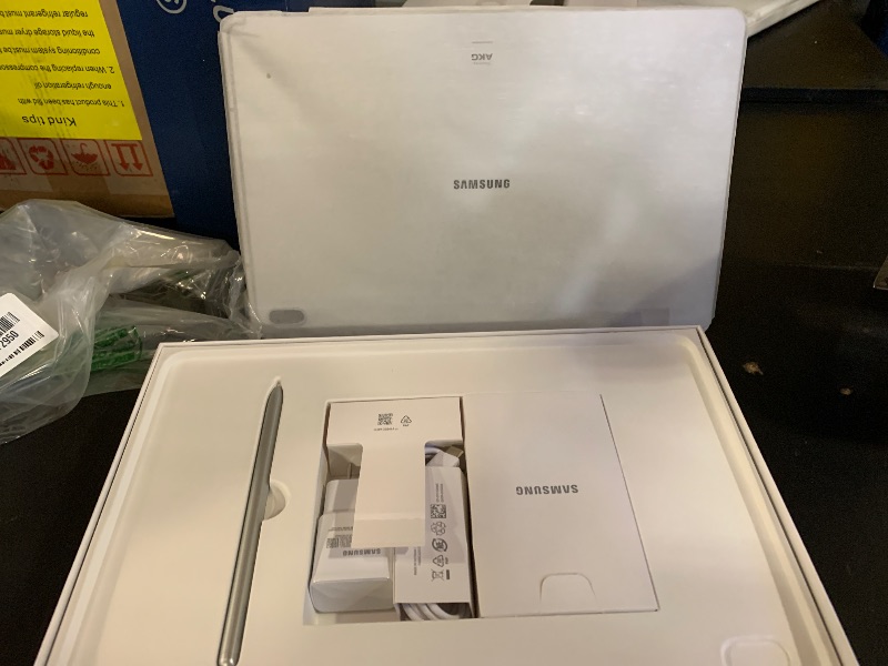 Photo 1 of SAMSUNG Galaxy Tab S7 FE 12.4” 256GB WiFi Android Tablet, Large Screen, S Pen Included, Multi Device Connectivity, Long Lasting Battery, US Version, 2021, Mystic Silver         Model #SDM: T733NZSFXAR mISTIC : sILVER  sm t733 sERIAL # R52R908ENDF