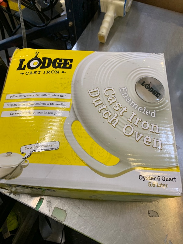 Photo 1 of Lodge 3 Quart Enameled Cast Iron Dutch Oven with Lid – Dual Handles – Oven Safe up to 500° F or on Stovetop - Use to Marinate, Cook, Bake, Refrigerate and Serve – Oyster White