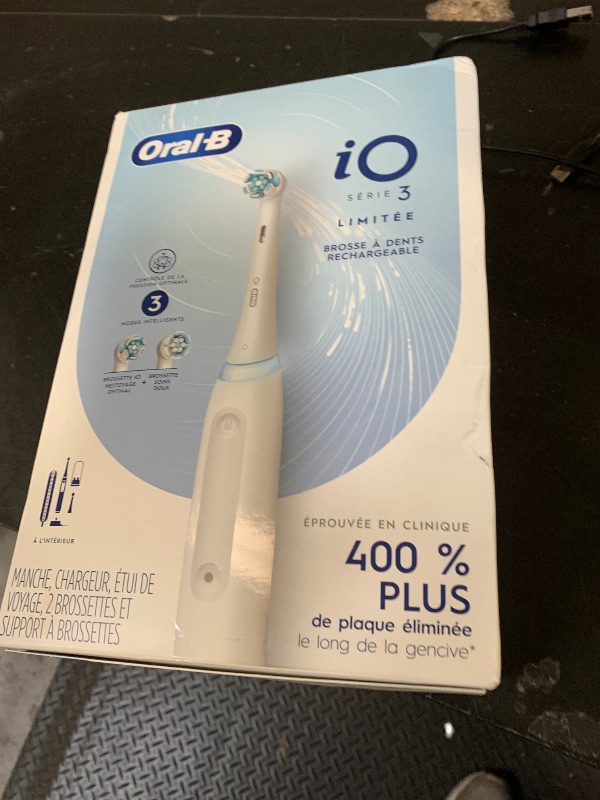 Photo 1 of Oral-B Rechargeable Electric Toothbrush, iO3 Limited Deep Clean, 3 Cleaning Modes, Visual Pressure Sensor to Protect Gums, 2 Brush Heads, Travel Case, White