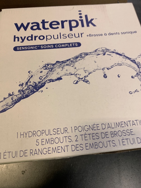 Photo 1 of Waterpik Sensonic Complete Care Water Flosser and Rechargeable Electric Toothbrush Combo Set for Teeth Cleaning and Flossing, CC-04, White, Packaging May Vary