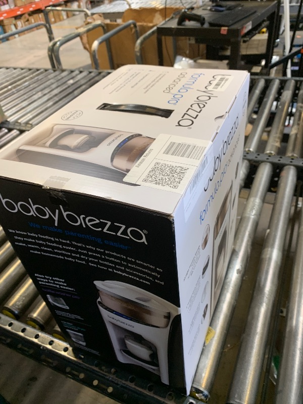 Photo 1 of Baby Brezza New and Improved Formula Pro Advanced Formula Dispenser Machine - Automatically Mix a Warm Formula Bottle Instantly - Easily Make Bottle with Automatic Powder Blending, White
