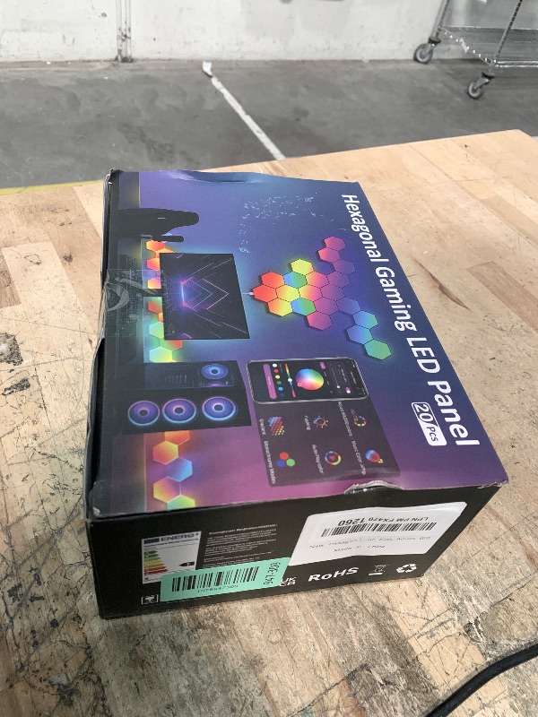 Photo 1 of **FACTORY SEALED** TISOFU 20 Pack Hexagon Lights LED Wall Panels, RGB Gaming Lights with APP/Music Sync & Remote, DIY Smart Modular Hexagonal Honeycomb Glide Hex Tiles Panel, Bedroom Party Decor Gifts