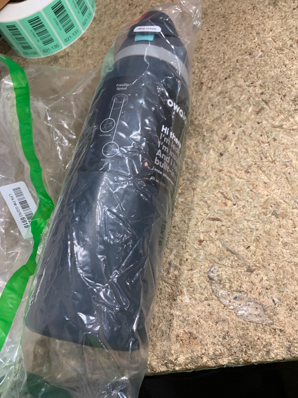 Photo 1 of **HAS A FEW DENTS**Owala FreeSip Insulated Stainless Steel Water Bottle with Straw for Sports and Travel, BPA-Free, 40oz, Foggy Tide