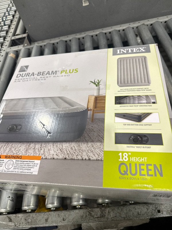 Photo 1 of **HAS A SMALL TEAR**Intex 18" Queen Essential Rest Airbed with Fiber-Tech RP