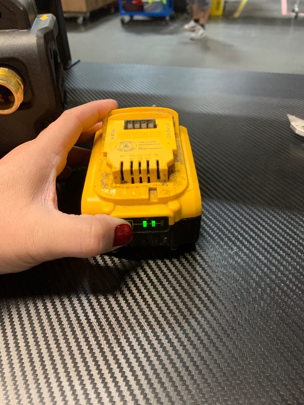 Photo 1 of ***BATTERY IS CRACKED BUT ITEM WAS TEATED WITH BATTERY AND WAS FUNCTIONAL***

DEWALT 20V MAX Transfer Pump, 10 GPM, Powerful and Lightweight, Profesional Grade Versatility, Bare Tool Only (DCE050B)