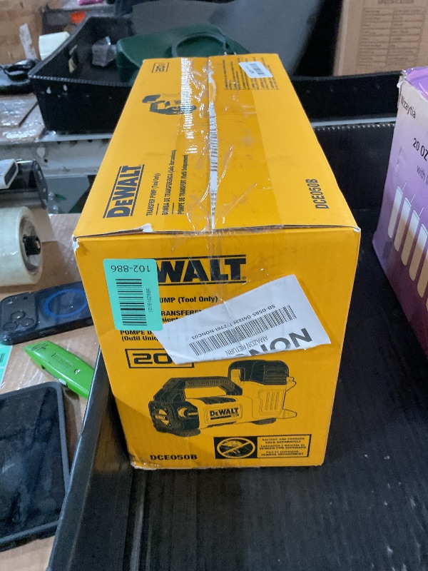 Photo 1 of ***BATTERY IS CRACKED BUT ITEM WAS TEATED WITH BATTERY AND WAS FUNCTIONAL***

DEWALT 20V MAX Transfer Pump, 10 GPM, Powerful and Lightweight, Profesional Grade Versatility, Bare Tool Only (DCE050B)