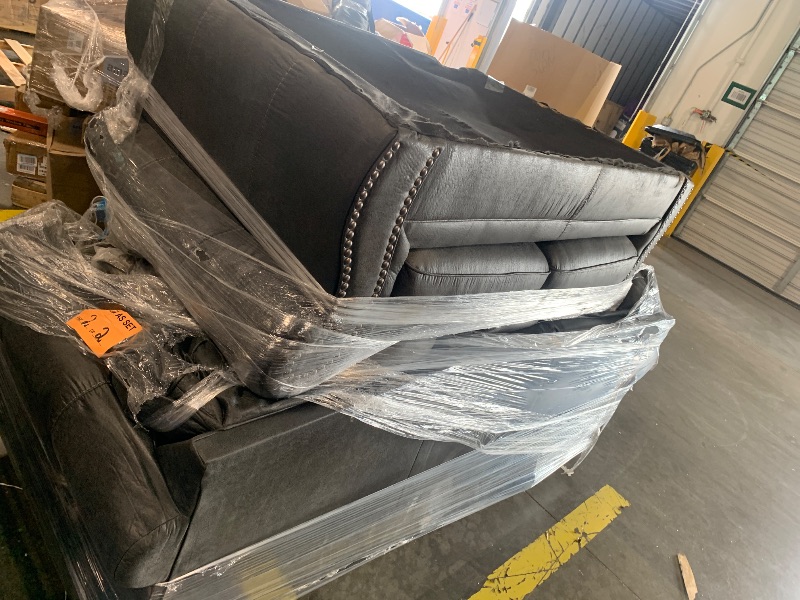 Photo 1 of *** BRING BIG TRUCK ITEM IS XL ON A PALLET *** Signature Design by Ashley Chatterton Rustic Faux Leather Loveseat with Nailhead Trim and 2 Throw Pillows, Reinforced Frame for Added Stability, Reversible Seat Cushions, Turned Legs, Dark Gray