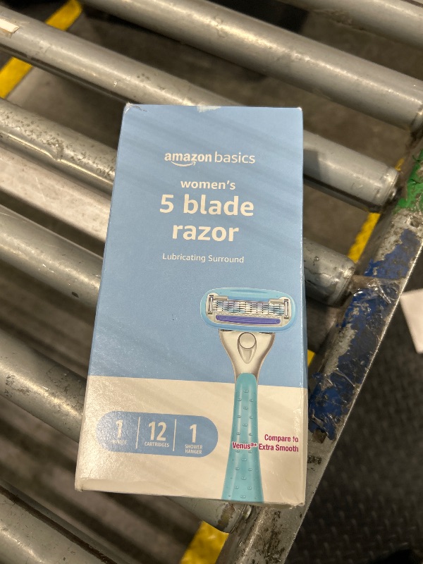 Photo 1 of **MISSING HANDLE**
Amazon Basics 5-Blade Razor Handle for Women, Includes 12 Cartridges and Shower Hanger, 14 Piece Set, Blue