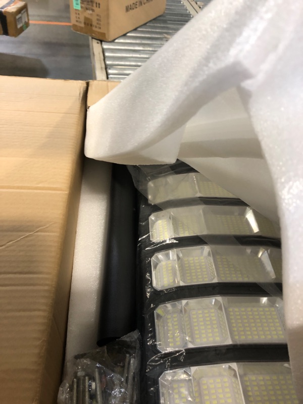 Photo 1 of ***ONE LIGHT DOES NOT WORK*** 10000W Solar Street Lights Outdoor, Solar Lights Outdoor Waterproof with Motion Sensor, IP66 Waterproof, Solar Street Light with Remote Control for Yard, Driveway, Parking Lot,Stadium 2Pack