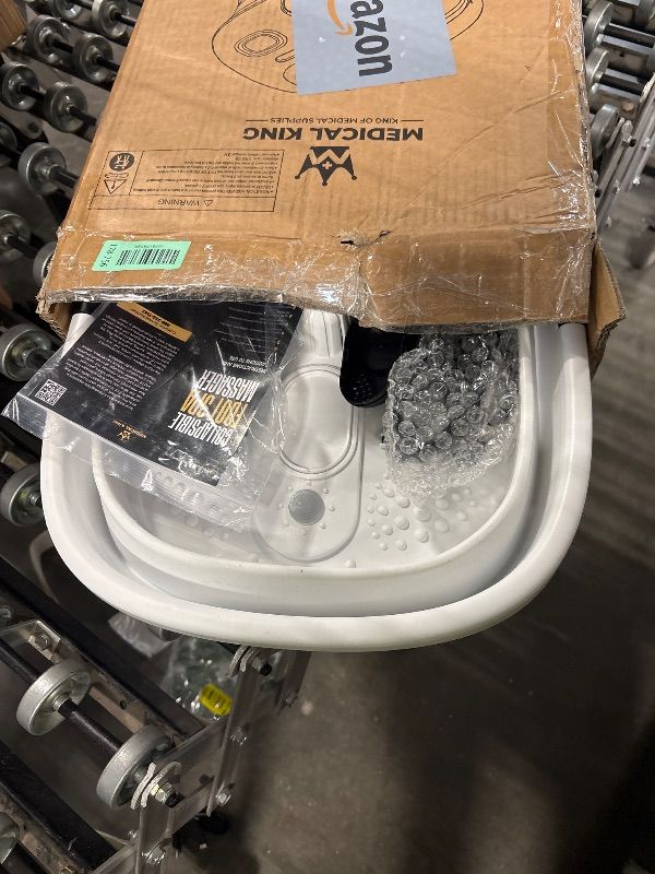 Photo 1 of **DIRTY**
Medical king Foot Spa with Heat and Massage and Jets Includes A Remote Control A Pumice Stone Collapsible Massager with Bubbles and Vibration