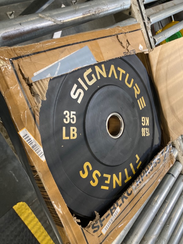 Photo 1 of ** PARTIAL SET*** *** only one plate 35 lbs****Fitvids 2-Inch Olympic Bumper Weight Plates Including 280 LB Weight Plates & 7FT Olympic Barbell Bar, Colored