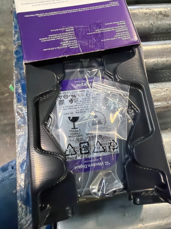 Photo 1 of **UNTESTED**
Western Digital 4TB WD Purple Surveillance Internal Hard Drive HDD - SATA 6 Gb/s, 128 MB Cache, 3.5" - WD44PURZ