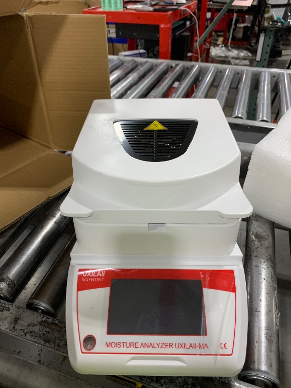 Photo 1 of UXILAII SCIENTIFIC Halogen Heating Lab Moisture Analyzer 110g x 0.001g Spanish English Germany Menu Balance Meter 0.01% Readability 110V 3 Drying Modes Touch Screen RS232 Interface Water Content Test