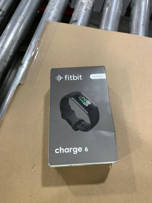 Photo 1 of Fitbit Charge 6 Fitness Tracker with Google apps, Heart Rate on Exercise Equipment, 6-Months Premium Membership Included, GPS, Health Tools and More, Obsidian/Black, One Size (S & L Bands Included)