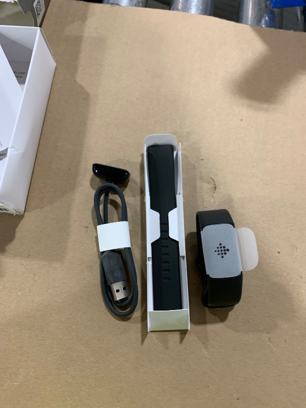 Photo 1 of Fitbit Charge 6 Fitness Tracker with Google apps, Heart Rate on Exercise Equipment, 6-Months Premium Membership Included, GPS, Health Tools and More, Obsidian/Black, One Size (S & L Bands Included)