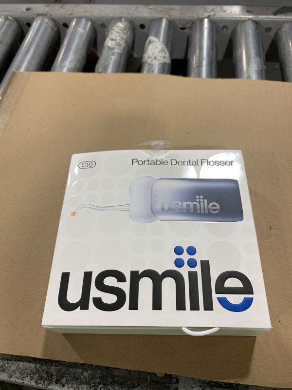 Photo 1 of usmile C10 Portable Water Flosser – Travel-Friendly, 95-Day Battery, 4 Modes, 360° Nozzle, 180ml Tank, IPX7 Waterproof, Dentist-Recommended for Braces, Implants & Sensitive Gums (Inkstone Black)