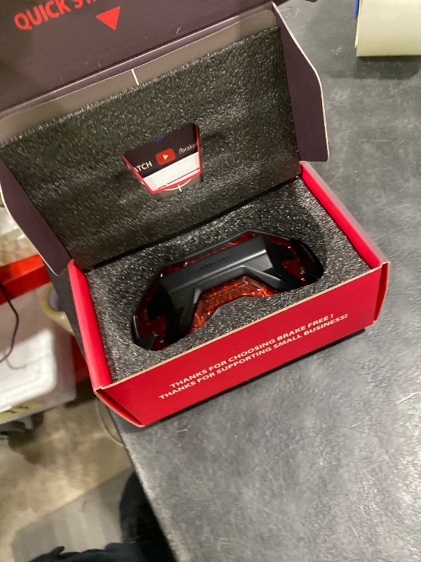 Photo 1 of Brake Free Helmet Light - Smart Wireless Motorcycle Lights- Weatherproof LED Motorcycle Helmet Light - Lightweight & Aerodynamic Design - Smart Brake Detection - Single Button Operation - Black