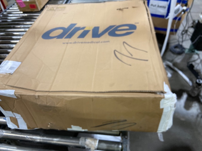 Photo 1 of Drive Medical SSP220DDA-ELR Silver Sport 2 Full-Reclining Transport Wheelchair with Detachable Desk Arms and Swing-Away Elevating Leg Rest, Black