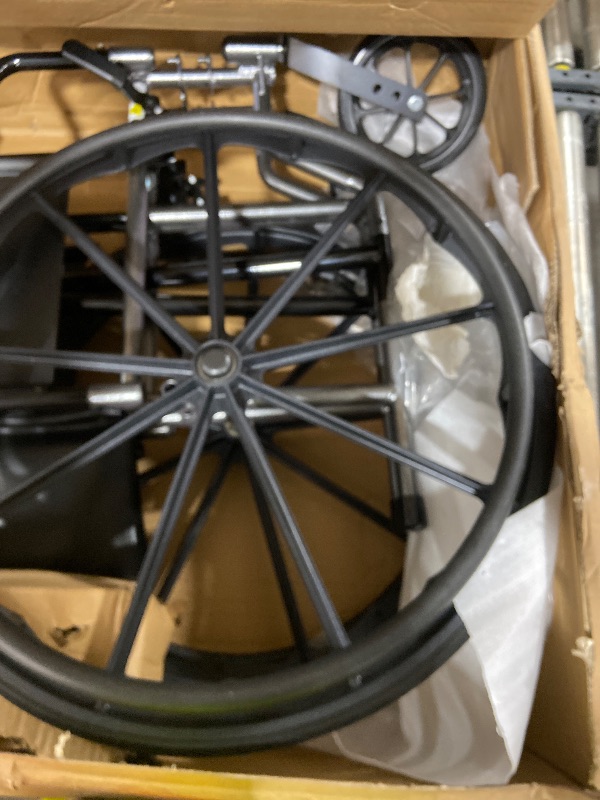 Photo 1 of Drive Medical SSP220DDA-ELR Silver Sport 2 Full-Reclining Transport Wheelchair with Detachable Desk Arms and Swing-Away Elevating Leg Rest, Black