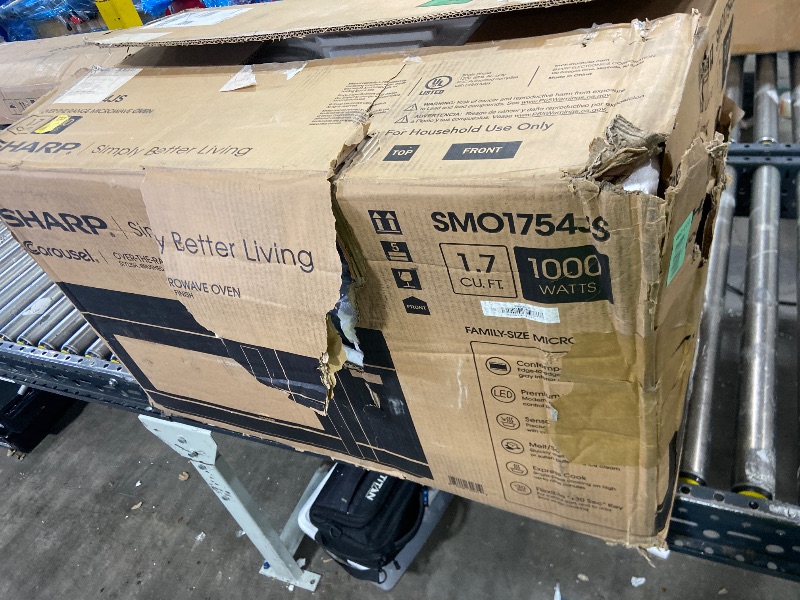 Photo 1 of SHARP SMO1754JS Over the Range Microwave Oven with 13.6" Carousel Turntable, 30-inch, 1.7 Cubic Feet, 1,000 Watt, 300CFM Fan, Sensor Cooking, Edge to Edge Black Glass with Stainless