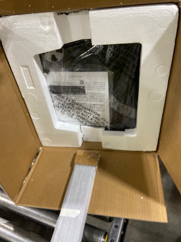 Photo 1 of Masterbuilt® 30-inch Digital Electric Vertical BBQ Smoker with Leg Kit, Side Wood Chip Loader and 710 Cooking Square Inches in Black, Model MB20070421