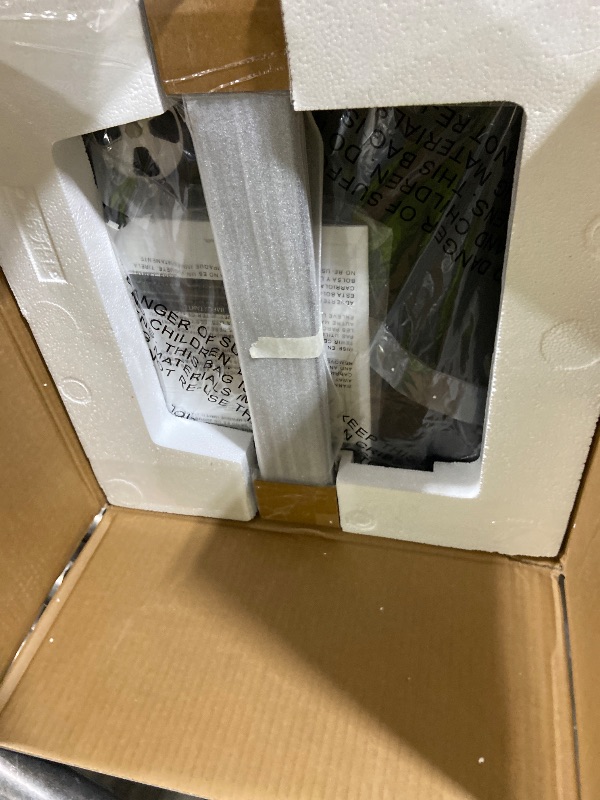 Photo 1 of Masterbuilt® 30-inch Digital Electric Vertical BBQ Smoker with Leg Kit, Side Wood Chip Loader and 710 Cooking Square Inches in Black, Model MB20070421