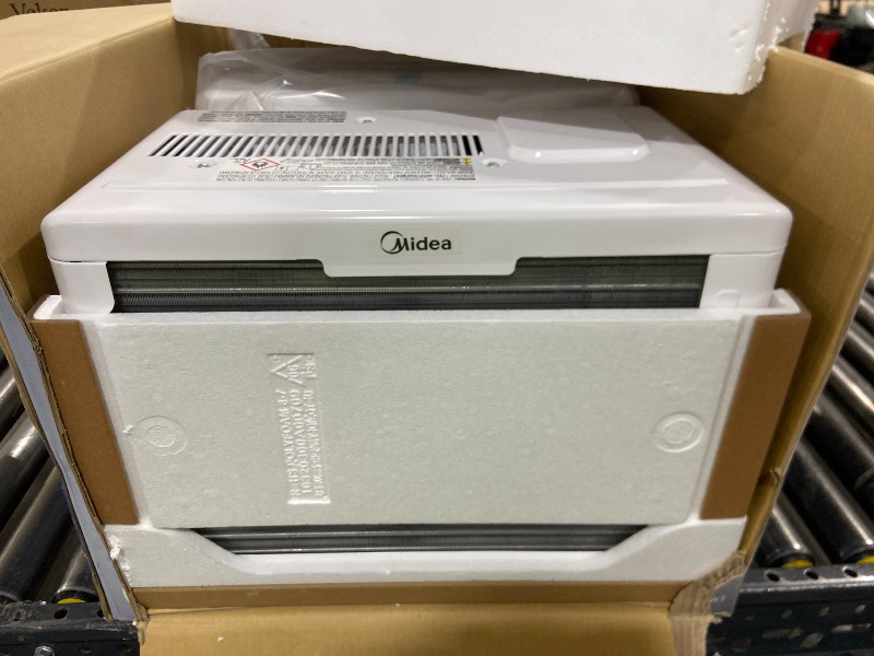 Photo 1 of Midea 12,000 BTU U Shaped Smart Inverter Window Air Conditioner - Cools 550 Sq Ft, Ultra Quiet with Open Window Flexibility - Alexa/Google Assistant Compatible - 35% Energy Savings, Remote (Updated)