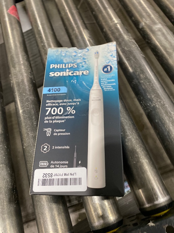 Photo 1 of Philips Sonicare 4100 Series Electric Toothbrush - Sonic Toothbrush with Advanced Sonic Technology, Pressure Sensor, Two Intensity Settings, Smartimer & Quadpacer, White, Model HX3681/23