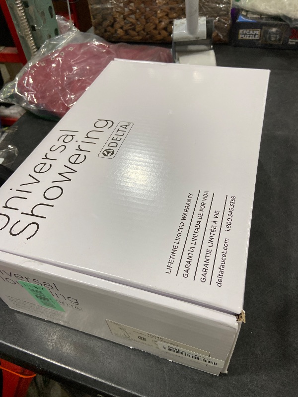 Photo 1 of Delta 6-Setting PivotPro 3-in-1 Combination Shower Head with ProClean Spray, Chrome Round Shower Head Rainfall with Handheld Spray, 1.75 GPM, Chrome 75648